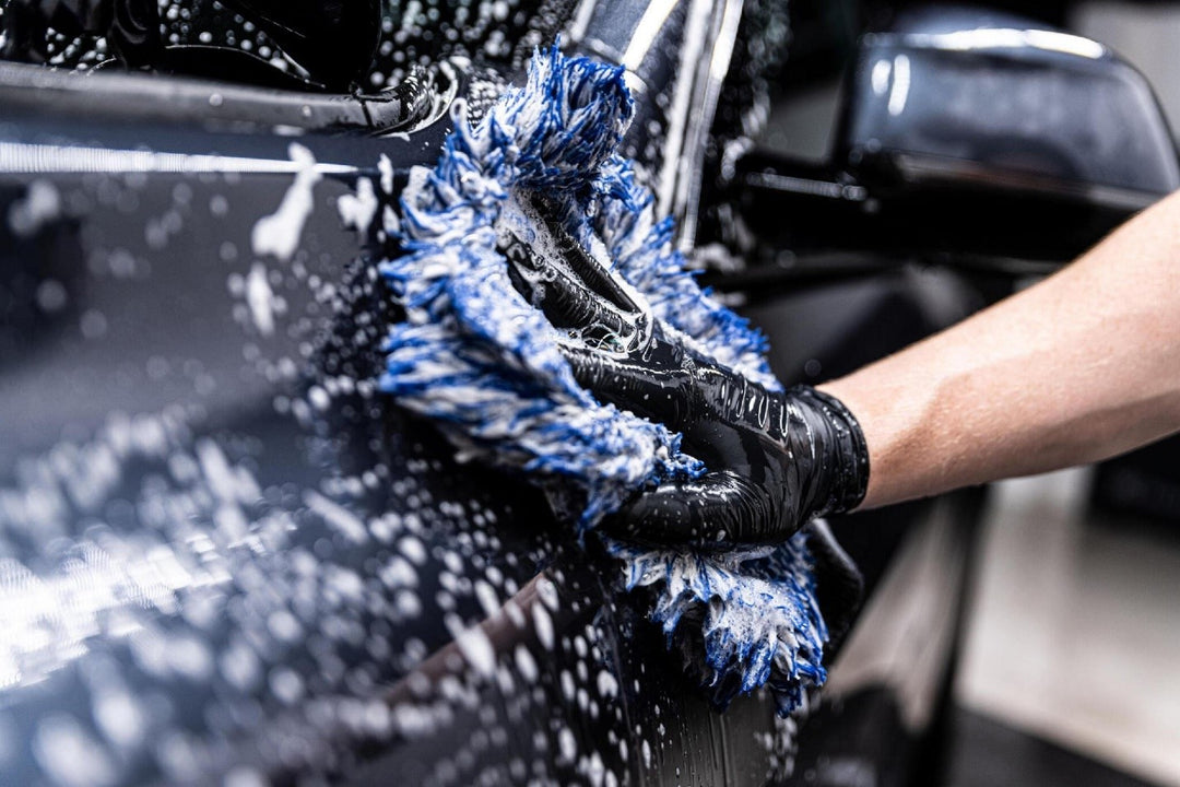 car wash employee thoroughly washes a modern car with a dedicated washing carcarez blog image