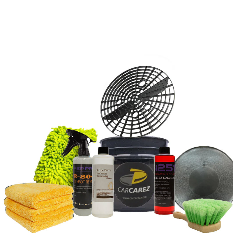 Car care products including a spray bottle, bucket, and cleaning tools on a white background