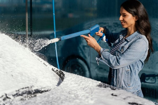 A collection of premium car wash products including foam cannons, brushes, and cleaning supplies. These tools are designed to provide a superior car cleaning experience.