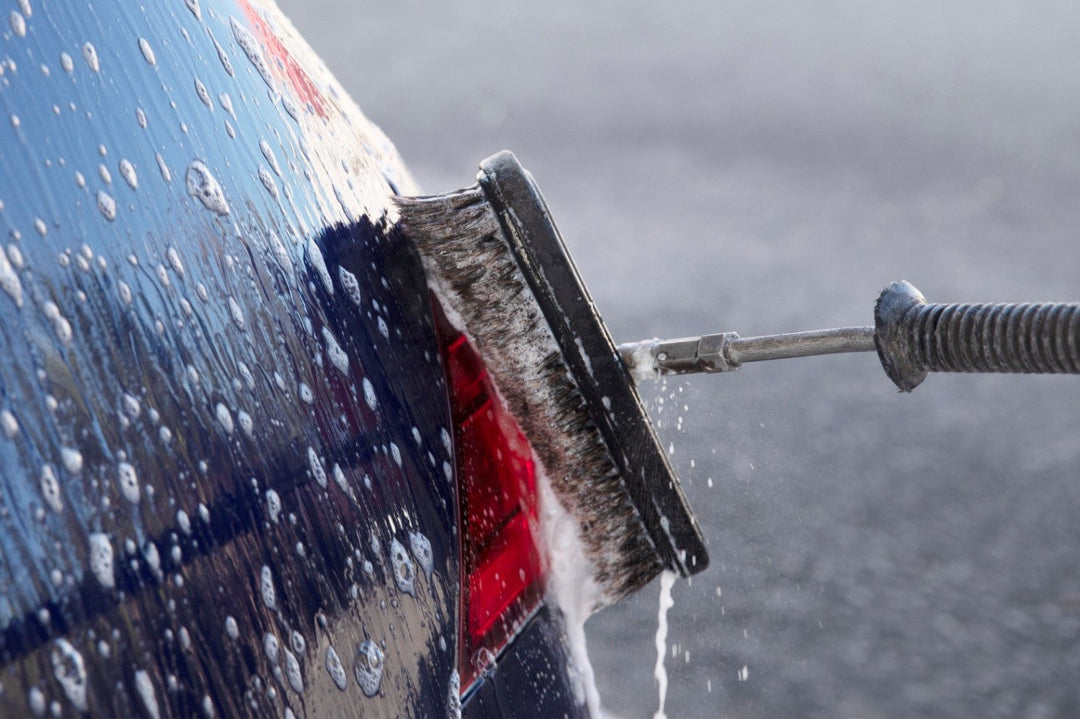 Carcarez professional car wash brushes and tools, including telescoping brushes, foam sprayers, and microfiber heads, displayed for comprehensive car cleaning