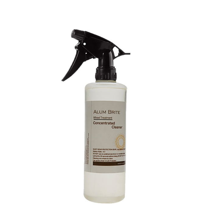 Alum Brite concentrated cleaner bottle with a spray nozzle on a white background